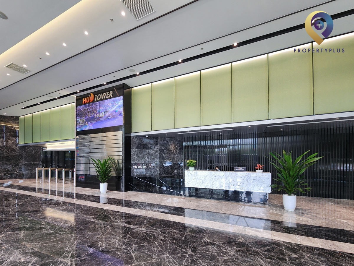 Modern and elegant lobby area at HUD Tower with reception desk